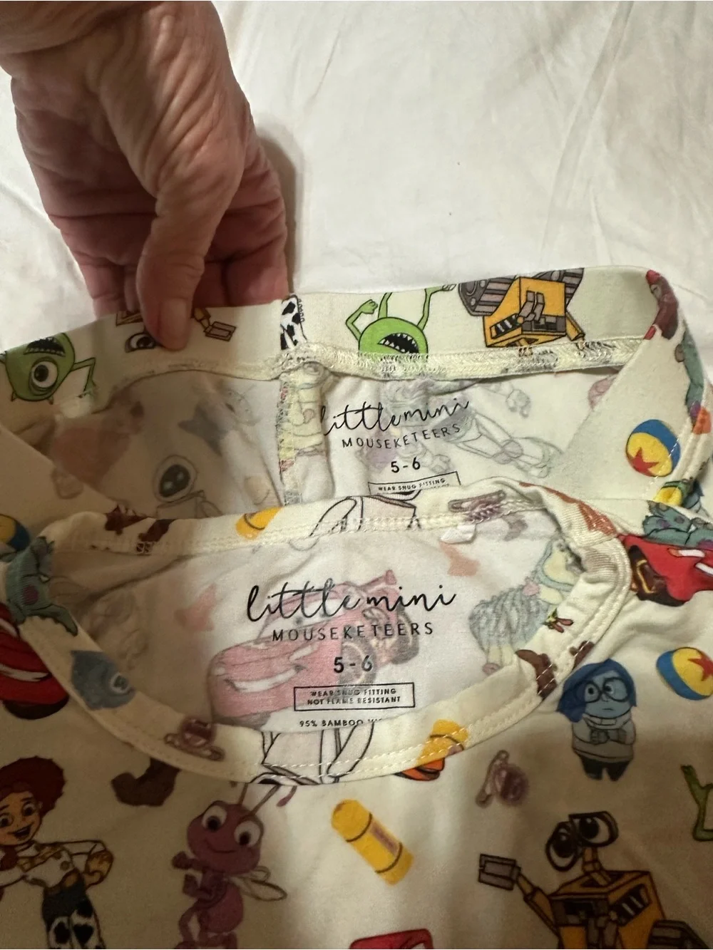 Little Sleepies Cream Pajama Set with Multicolor Toy Print